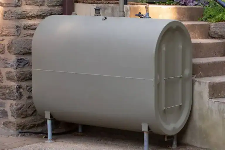 How can homeowners prevent heating oil spills, and what steps should be taken if one occurs?